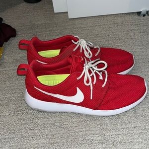 Nike women’s red running sneakers